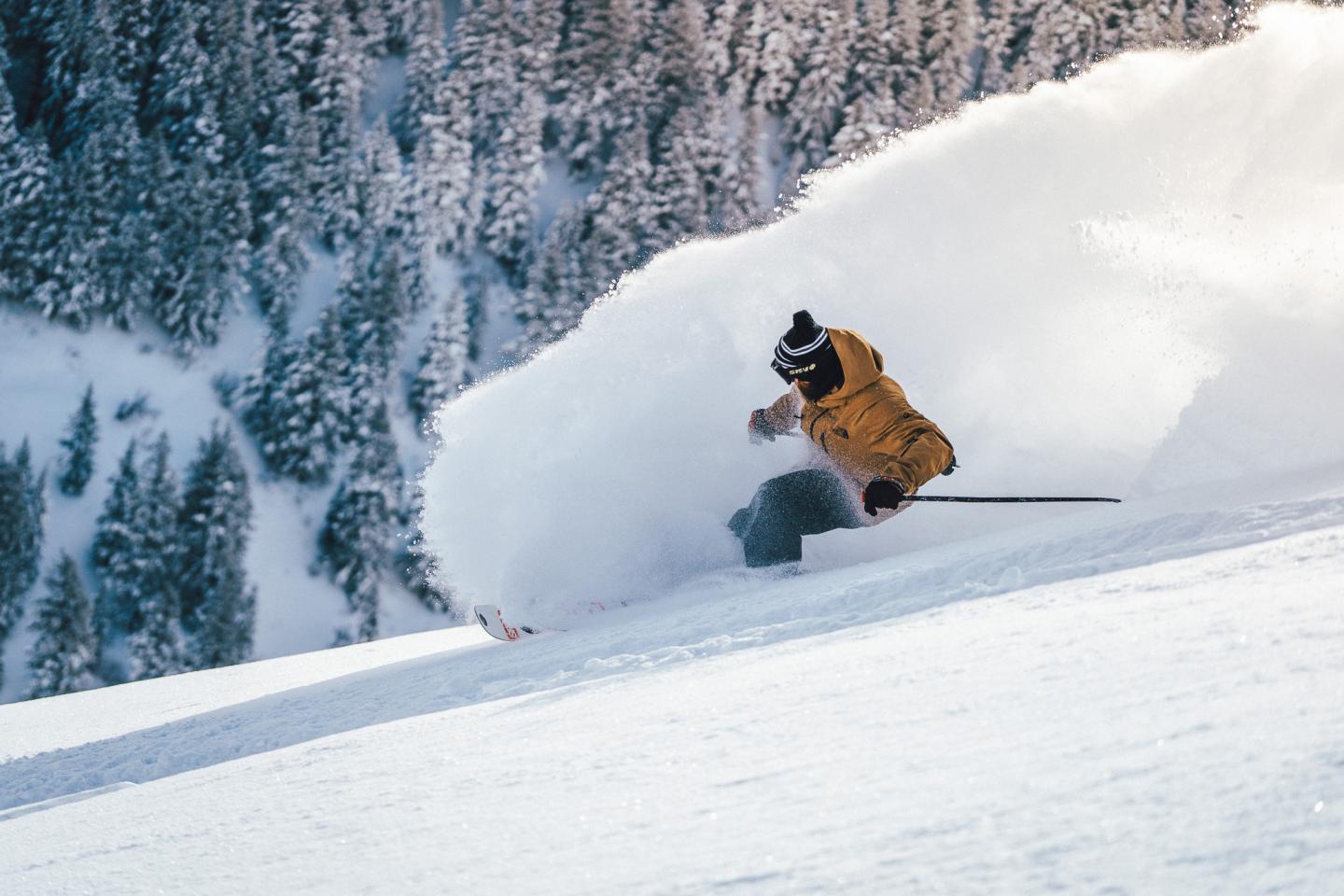 A person skiing through powder