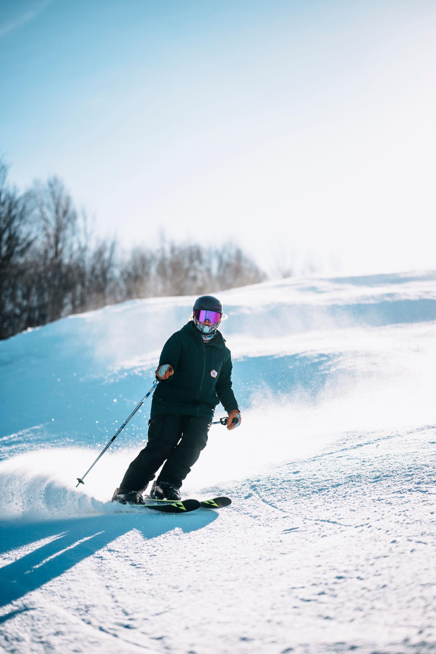 skiers making a turn