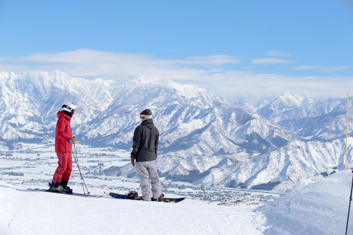 Skiers overlooking mountain at Muica Snow Resort