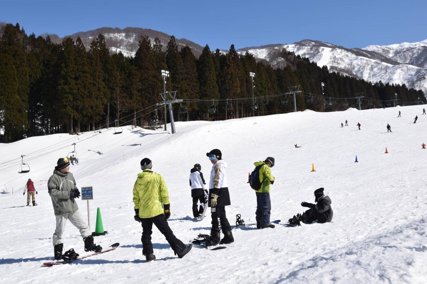 Ninox Snow Resort mountain and skiers
