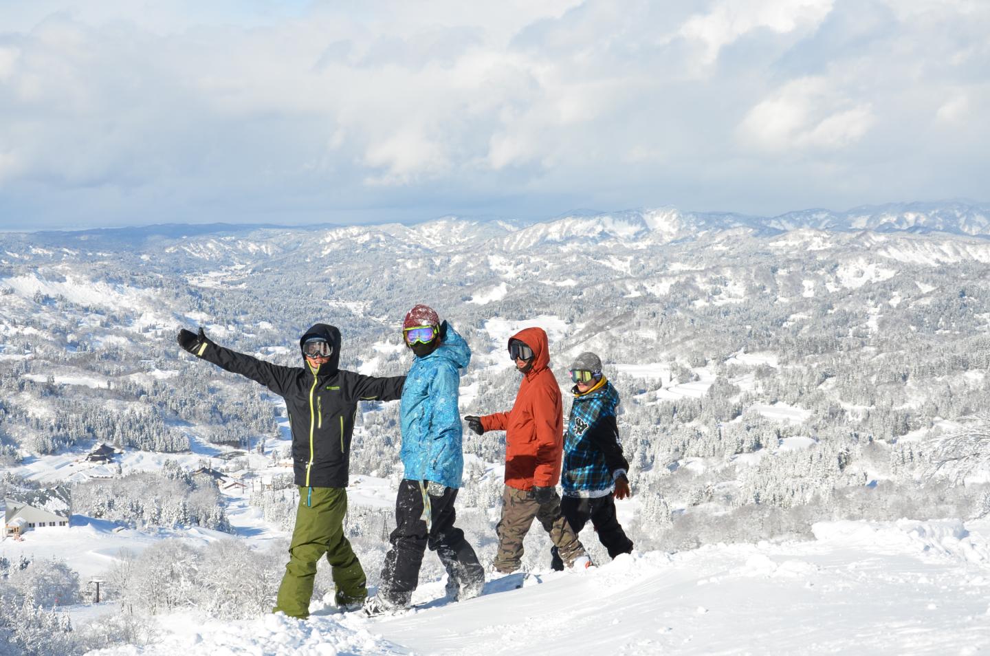 Skiers on top of mountain