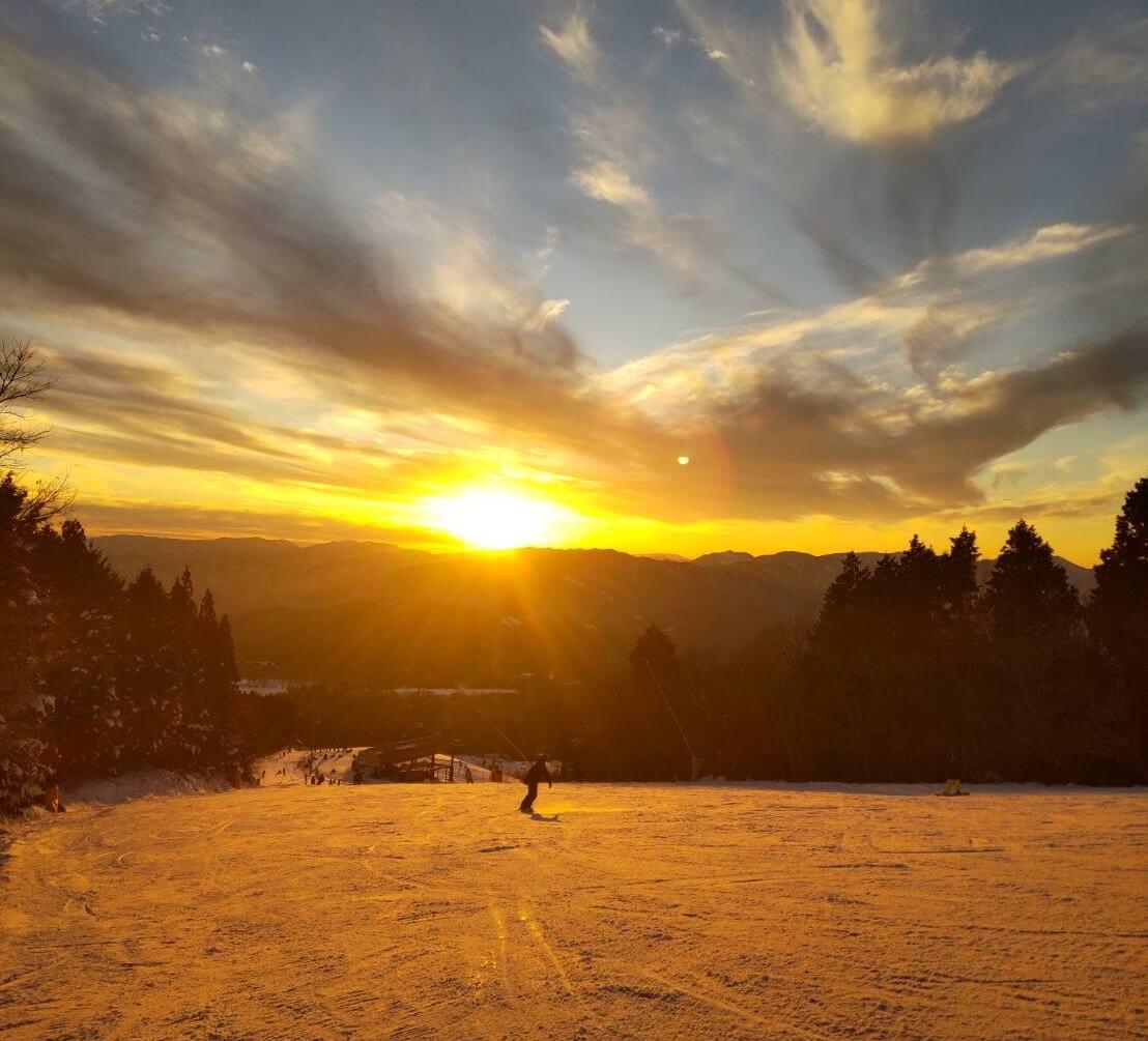 Skier and sunset at Washigatake Ski Resort
