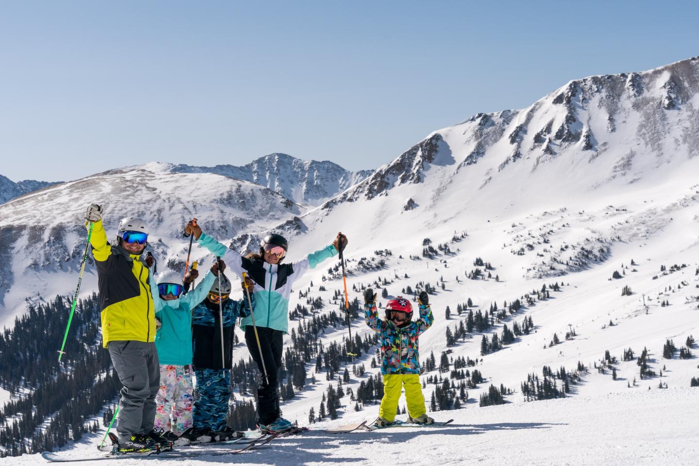 family celebrating at loveland ski area