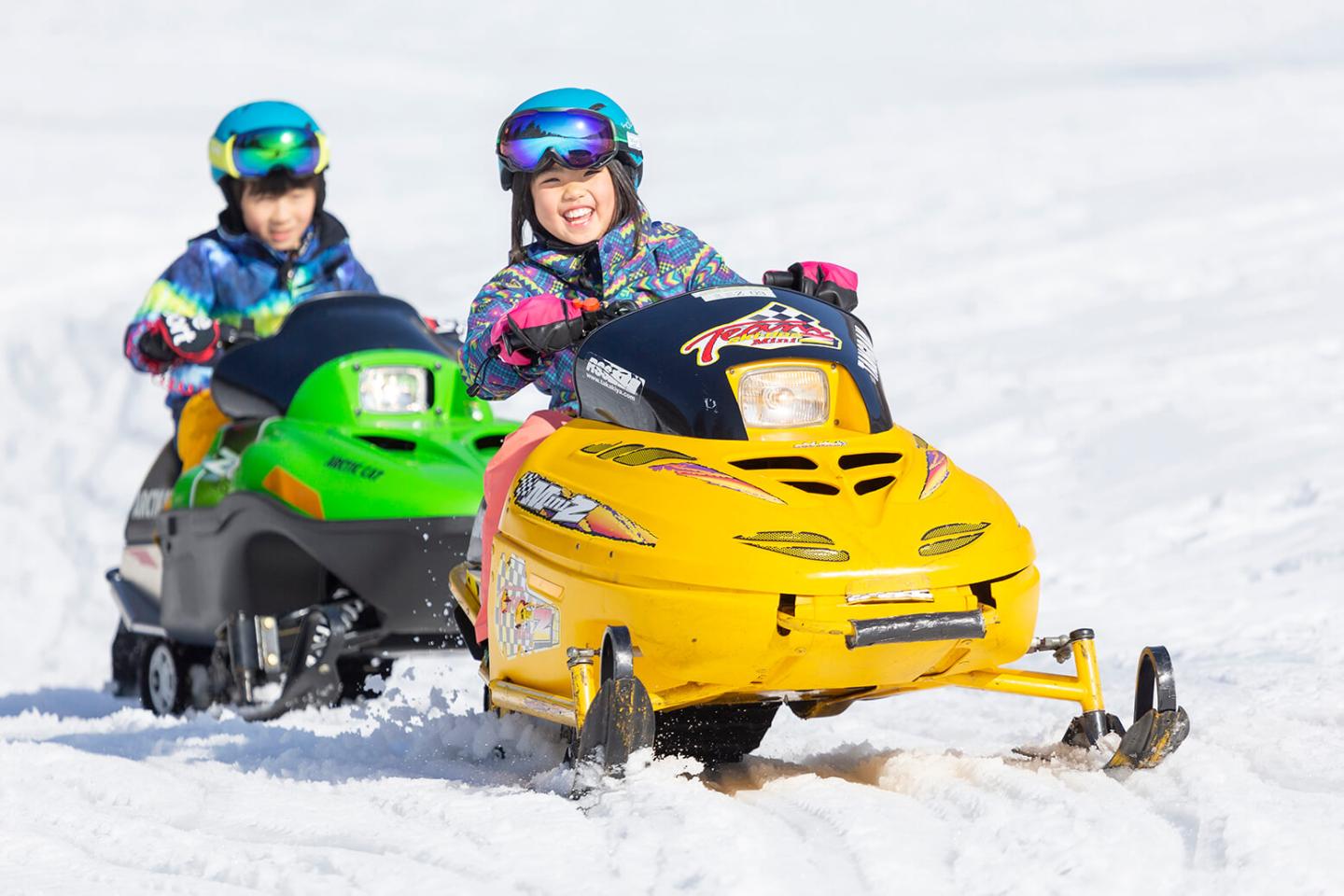 Tangram Ski Circus snowmobilers