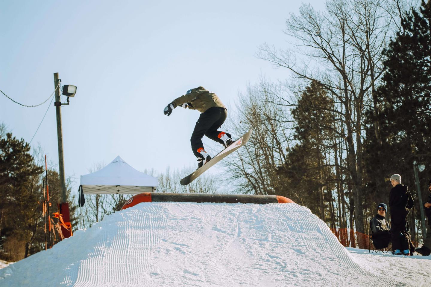 Mt. Holiday snowboarder jumping