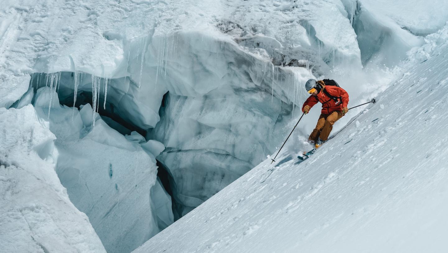 person skiing down mountain