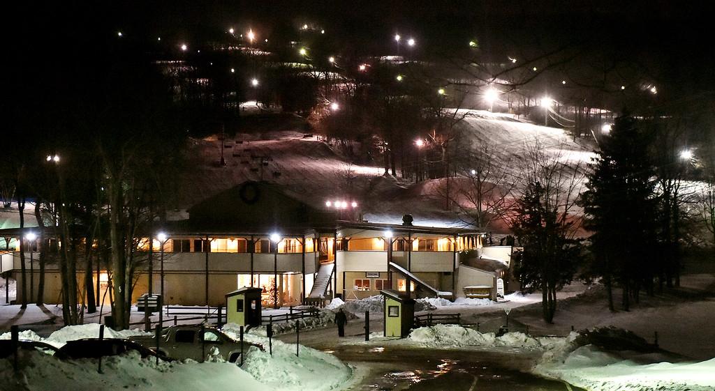 aerial view of powder ridge ski area and base area at night 
