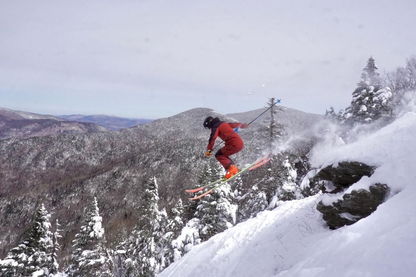 skier jumping a rock at Smugglers Notch Resort