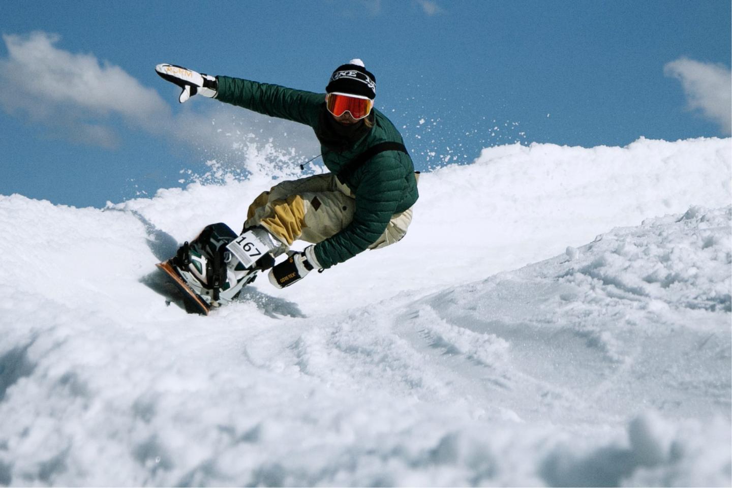 snowboarder cruising at Togari Onsen Ski Resort