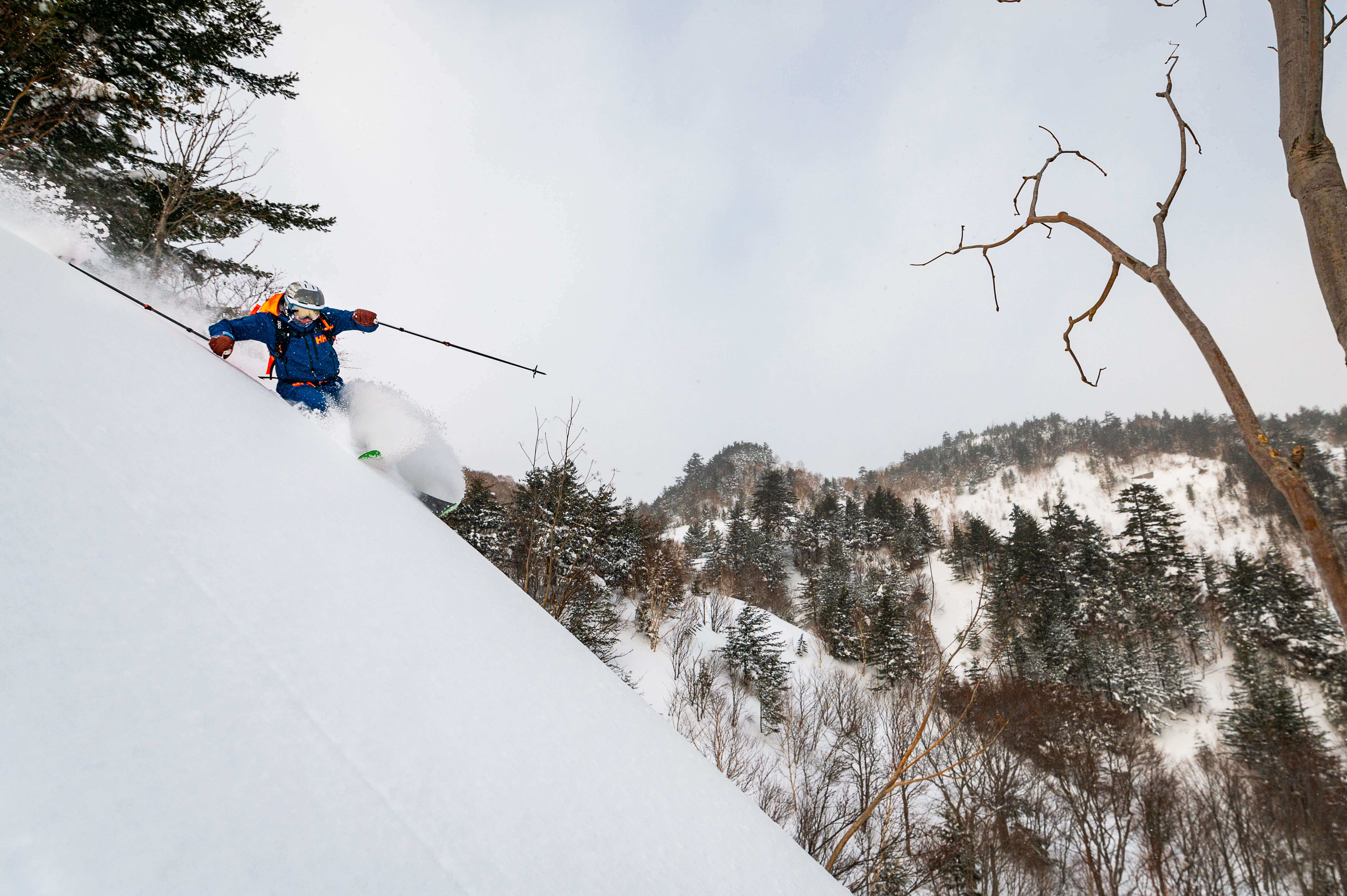 skier in the backcountry in Japan