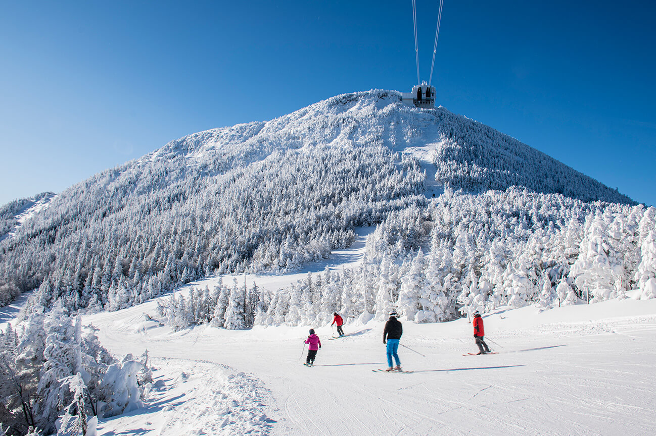 Skiers on a run at Jay Peak Vermont